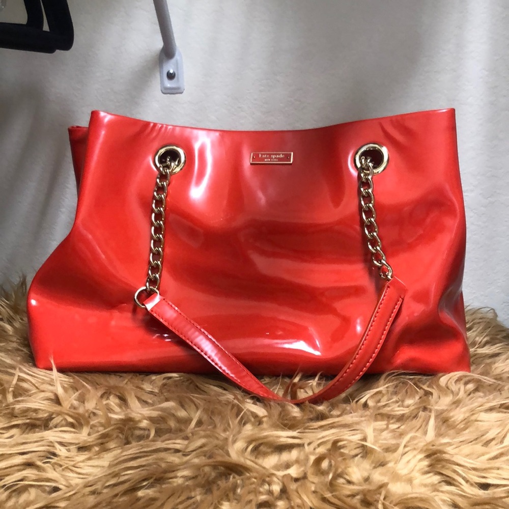 Bright orange Kate spade bag
